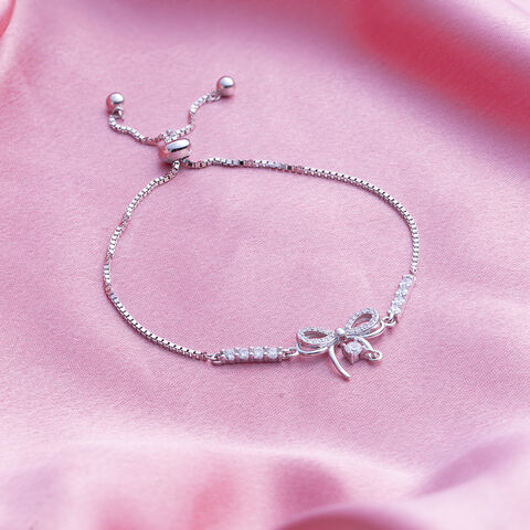 Reegalia Sterling Silver Bow Charm CZ Bracelet.