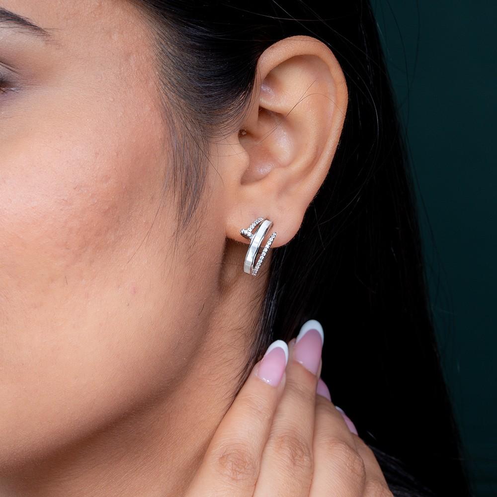 Reegalia Classic Curve Huggie Hoops in 925 Silver.